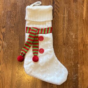 Festive White Knit Christmas Stocking with Red and Green Accents